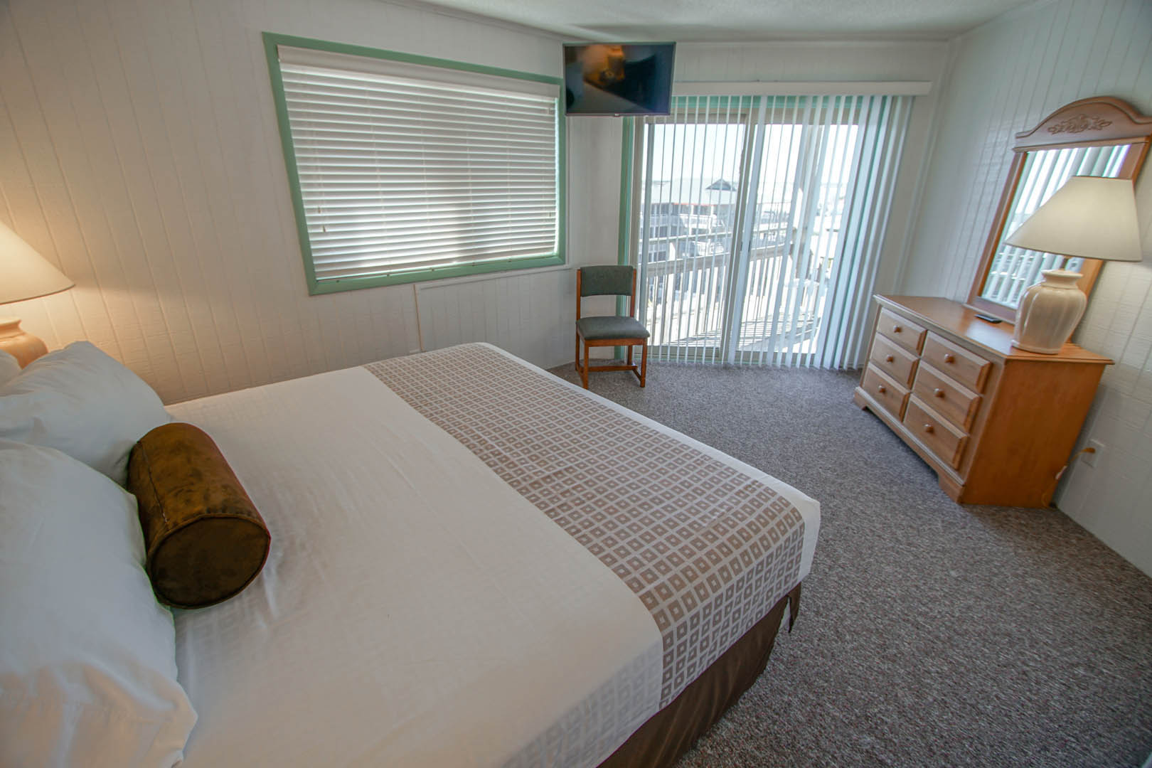 A spacious master bedroom at VRI's Outer Banks Beach Club in North Carolina.